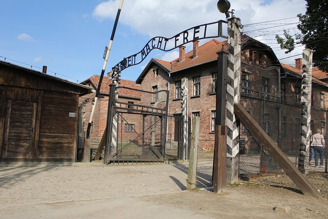 Auschwitz and Birkenau Memorial and Museum Guided Tour from Krakow - Auschwitz I: buildings, exhibits, and the first emotional impact