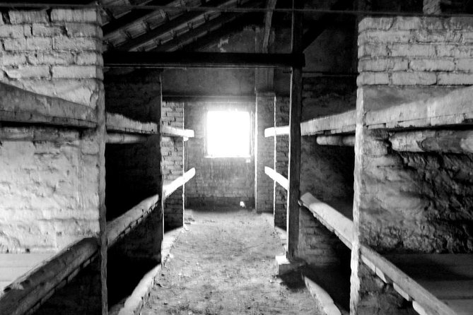 Auschwitz-Birkenau guided tour & skip the line Tickets & Transfer - Entering Auschwitz I with a museum guide