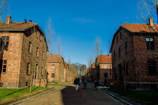 Auschwitz Birkenau Guided Tour Small Group with Hotel Pick up - The transfer to Birkenau and the scale of the site