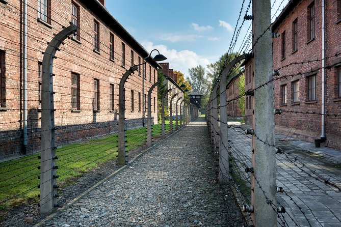 From Krakow: Auschwitz-Birkenau Memorial and Museum Guided Tour - Auschwitz: buildings, evidence, and prisoner life