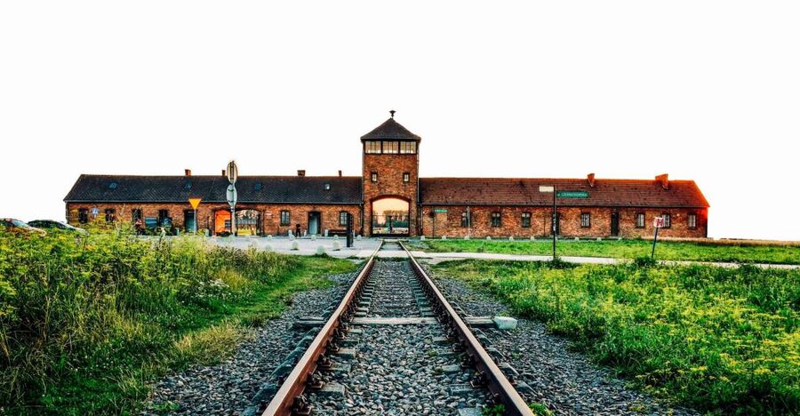 From Krakow: Auschwitz-Birkenau & Schindler's Factory Tour - Arriving at Auschwitz I