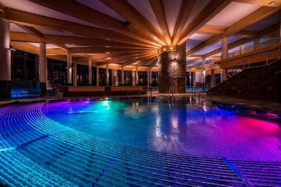 From Krakow: Full-Day Chocholowska Thermal Bath Tour - Outdoor pools, games, and slides