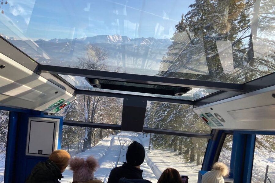 From Krakow: Zakopane, Tatra Mountains & Thermal Baths Tour - Riding the cable car up Gubałówka