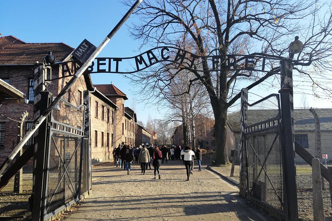From Warsaw Auschwitz and Krakow one day tour by train with pick up and drop off - Three hours in Krakow’s Old Town