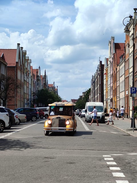 Gdansk: City Sightseeing Tour Eco Electric Buggy Golf Cart ! - Solidarity Square and the shipyard connection