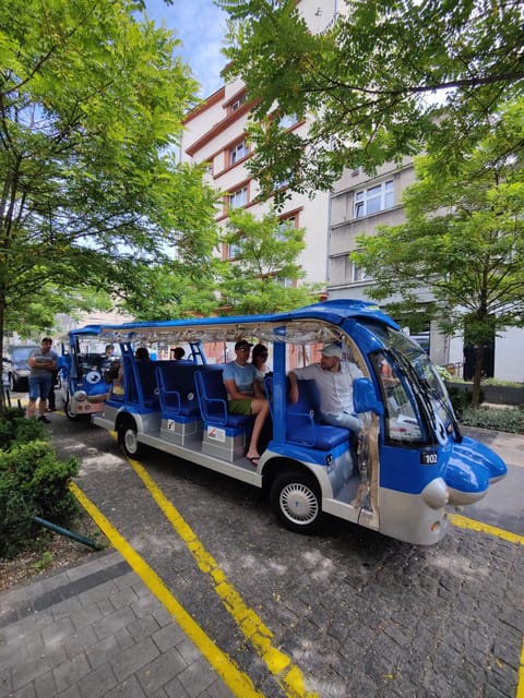 Gdansk: City Sightseeing Tour Eco Electric Buggy Golf Cart ! - The railway station, mills, and market buildings