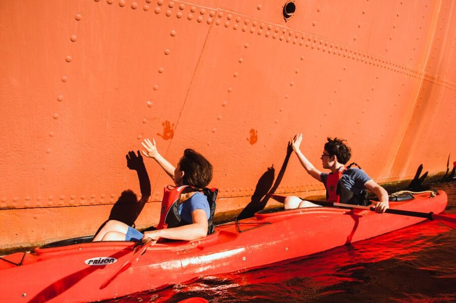 Gdansk: Guided Kayak Tour - Finding the red shipping containers near the yacht club