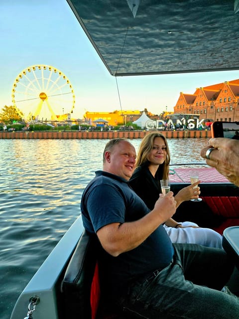 Gdańsk: Motława River Eco Cruise at Sunset with Prosecco - A small boat changes the feel