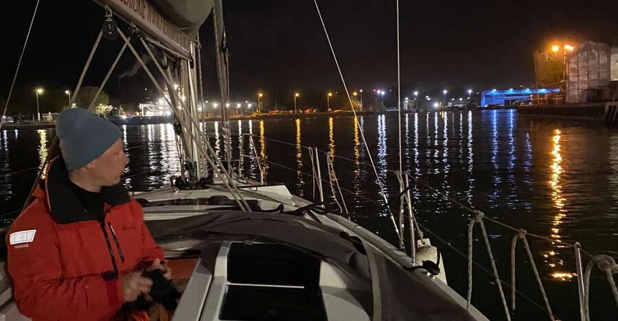 Gdansk: Scenic Evening Yacht Cruise with Welcome Drink - The Crane and Granary Island after dark