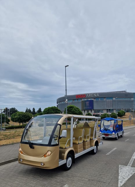 Gdansk: Shared or Private City Tour Sightseeing By Golf Cart - Gates, market buildings, and the grand central streets