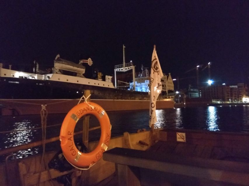Gdańsk: Sunset Cruise on a Historic Polish Boat - The old crane, water gates, and tenement houses