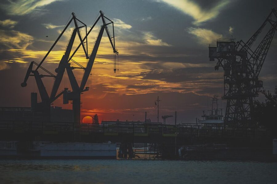 Gdańsk: Sunset Cruise on a Historic Polish Boat - Starting among the Gdańsk Shipyard cranes
