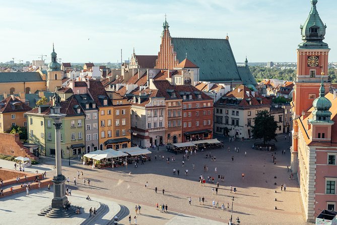 Highlights & Hidden Gems With Locals: Best of Warsaw Private Tour - Entering the Old Town by way of the Royal Castle