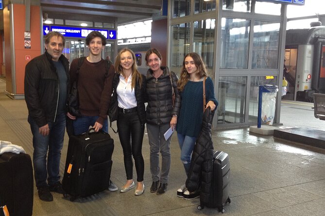 Krakow Airport-City Center and Back -private 2 ways transfer - Arriving in Krakow with a name sign and a waiting car