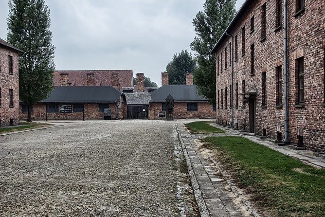 Krakow: Auschwitz-Birkenau Shared English Tour and Transfer - Auschwitz I: prison blocks, evidence, and a controlled route