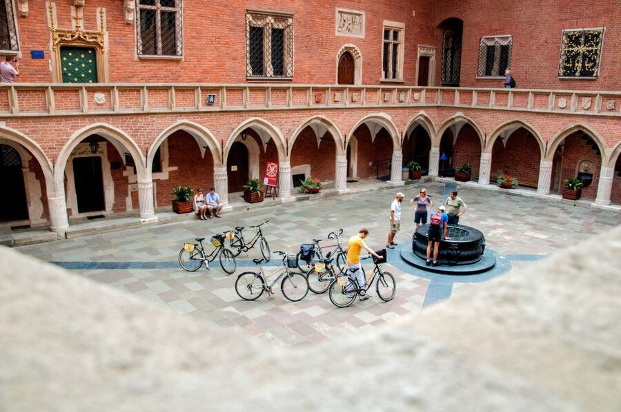 Krakow: Bike Tour of Old Town, Jewish Quarter and the Ghetto - Main Market Square, the theatre, and the old defenses