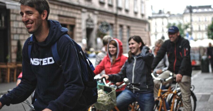 Krakow: Bike Tour of the Old Town, Kazimierz, and the Ghetto - Returning past the Słowacki Theatre