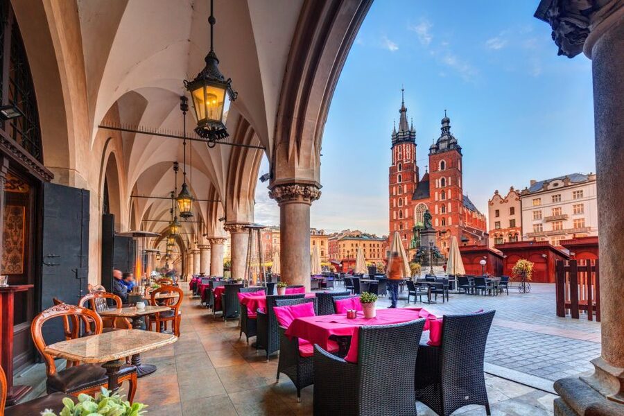Krakow: Electric Car Sightseeing Tour - Headphones, commentary, and the driver