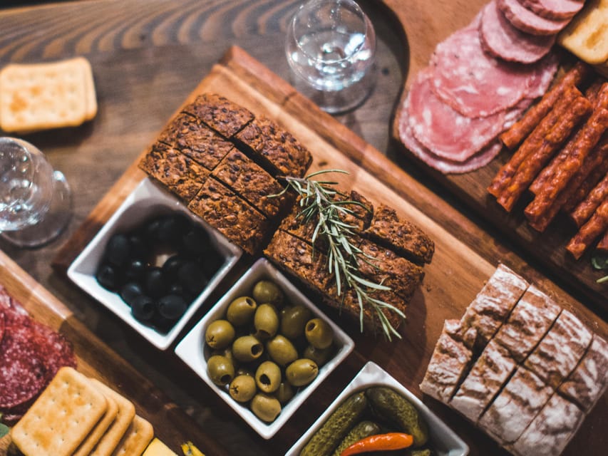 Kraków: Guided Vodka Tour with Food and Drink Tastings - Starting with Polish tapas and two clear vodkas