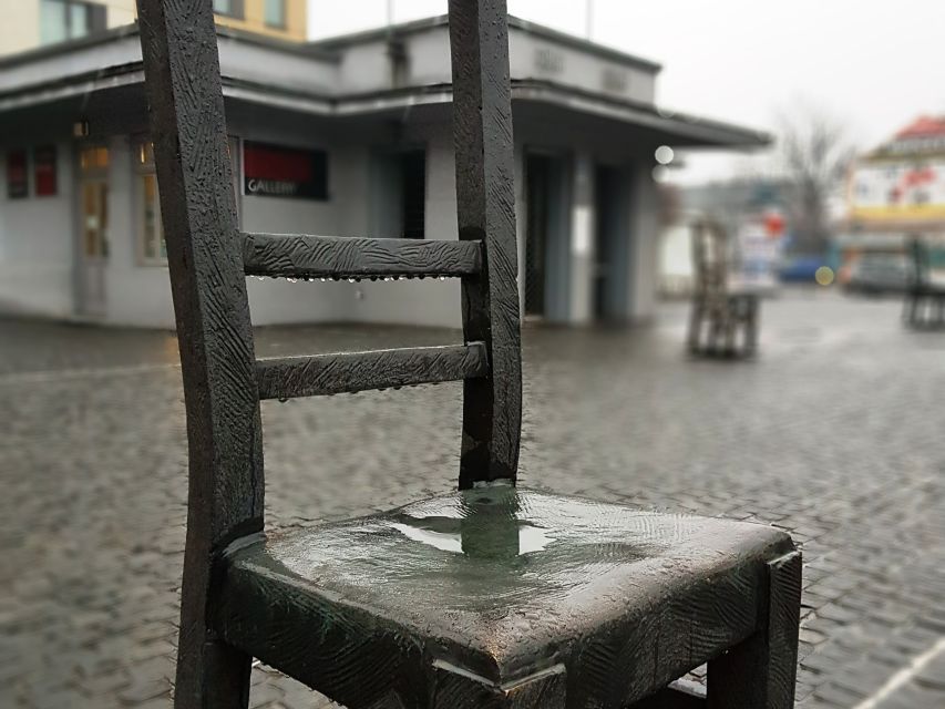 Krakow: Jewish Quarter and Former Ghetto Tour by Golf Cart - The Eagle Pharmacy and fragments of the Ghetto Wall