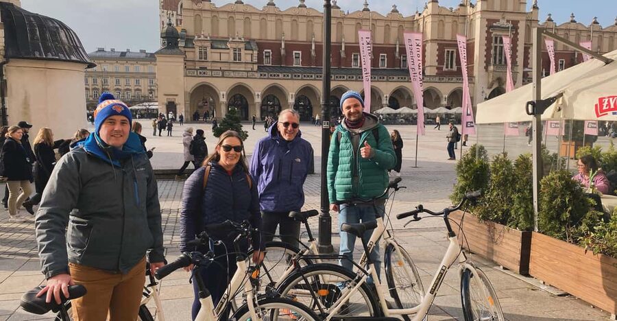 Krakow: Old Town and Kazimierz Guided Bike Tour - Wolnica Square opens the door to Kazimierz