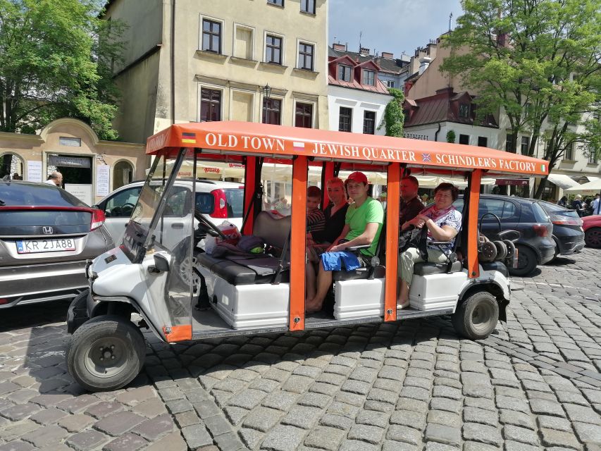 Krakow: Private Sightseeing Tour by Electric Car - Riding through Krakow in a heated electric car
