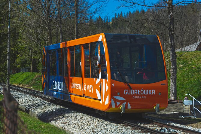 Krakow to Zakopane: Funicular, Tasting and Thermal Baths Day Trip - One hour and a half on Krupówki Street