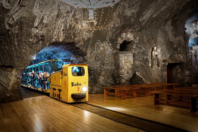 Krakow: UNESCO Bochnia Salt Mine Tour & Boat Expedition - Entering Bochnia through the old mining elevator