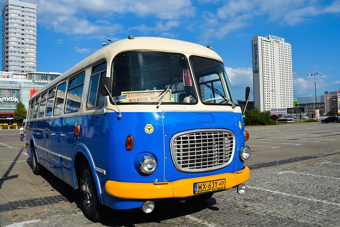 Warsaw City Sightseeing in a Retro Bus for Groups - Old Town and the cost of rebuilding Warsaw