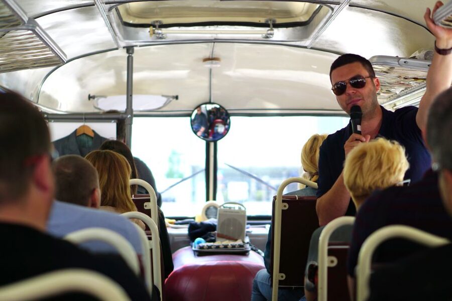 Warsaw: Highlights Guided Retro Bus Tour - The Palace of Culture closes the loop