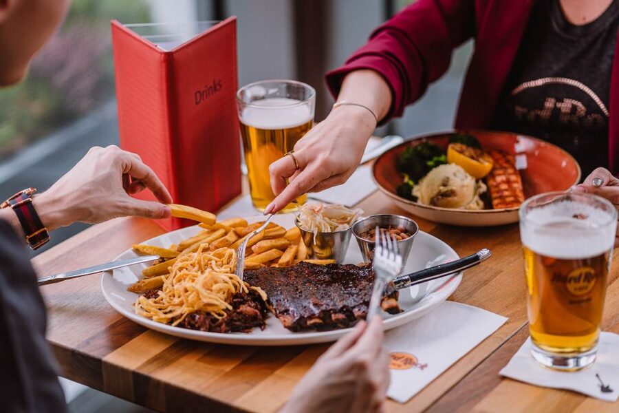 Warsaw: Lunch or dinner at Hard Rock Cafe with Skip-the-Line - The music displays and Rock Shop add value