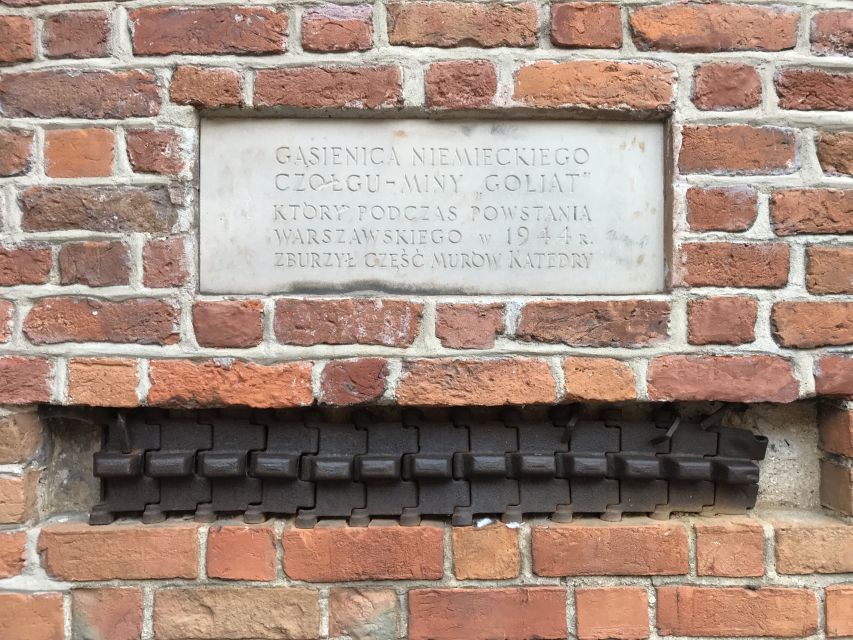 Warsaw: Old Town Guided Walking Tour - City walls, the Barbican, and a river view