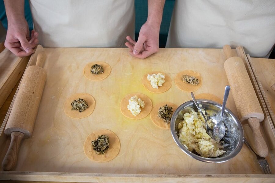 Warsaw: Polish Dumplings Cooking Class - Sitting down to a full plate of your own work
